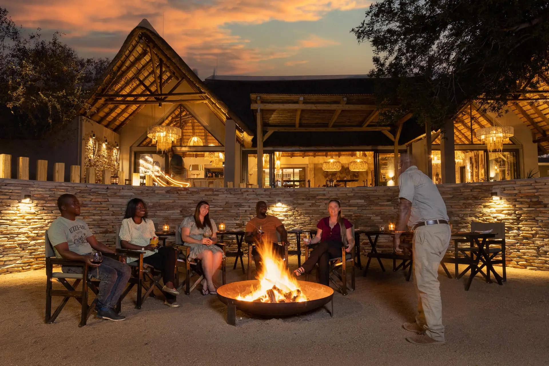 Safari campfire glowing at night